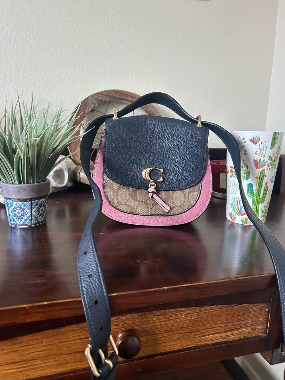 Coach Signature Remi Saddle Crossbody in navy blue and pink, classic coach
